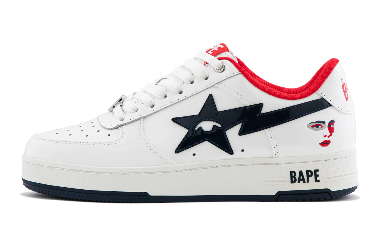 A white sneaker with a black star and "BAPE" branding on the side.