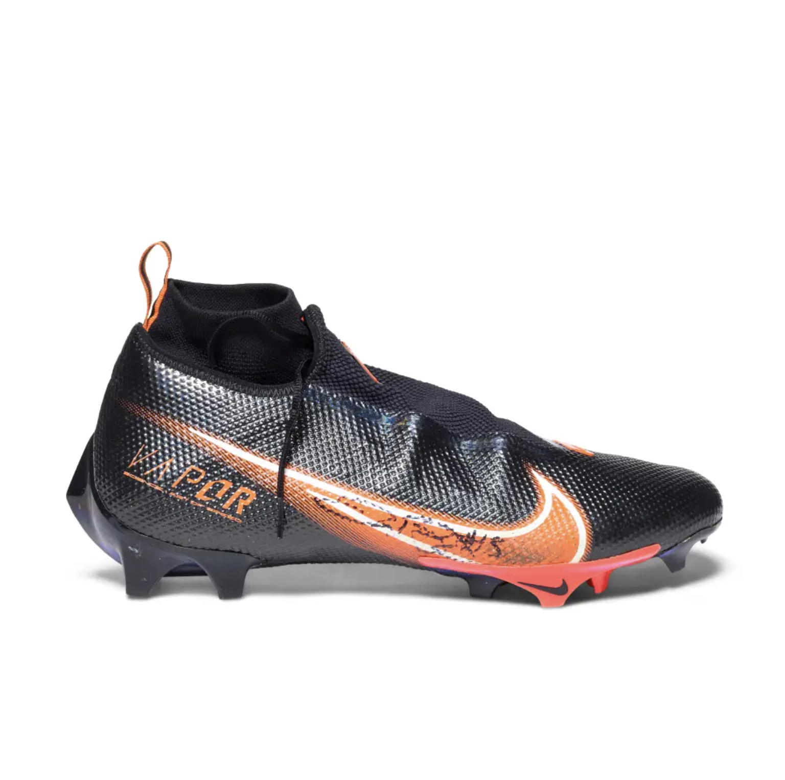Black and orange Nike Vapor soccer cleats with textured upper and Nike logo.