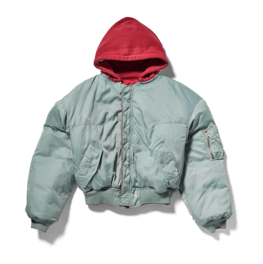A red hooded jacket with a gray body and zipper pockets.