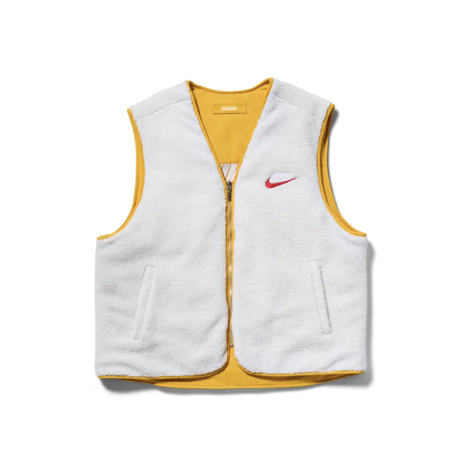 A white and yellow Nike-branded athletic vest with a zipper and pockets.