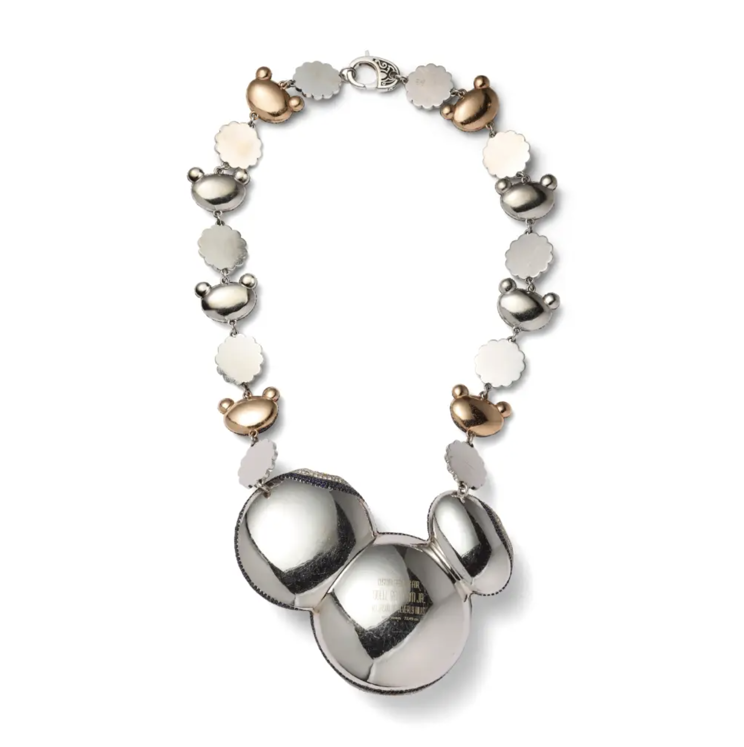 A silver-colored necklace with alternating spherical and cloud-shaped charms.