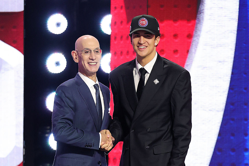 Karim Lopez and NBA Commissioner Adam Silver 
