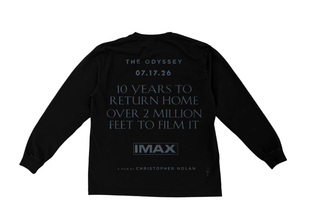 A black long-sleeved shirt with text reading "THE ODYSSEY 07.17.26 10 YEARS TO RETURN HOME OVER 2 MILLION FEET TO FILM IT IMAX A FILM BY CHRISTOPHER NOLAN".