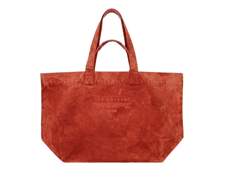 A large, red tote bag with the text "The Odyssey" printed on it.