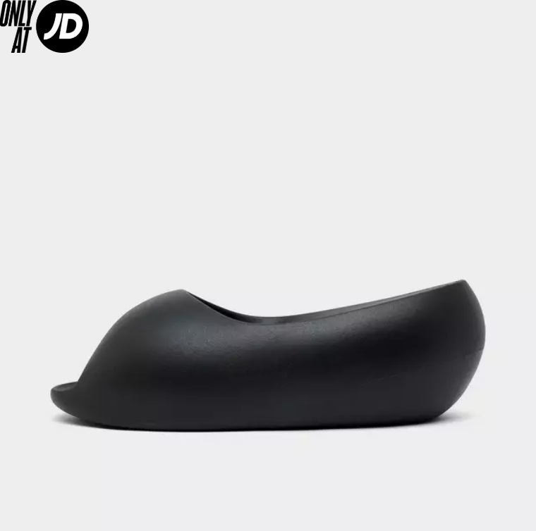 Black shoe-shaped object on a white background with the text "ONLY AT JD" in the top left corner.