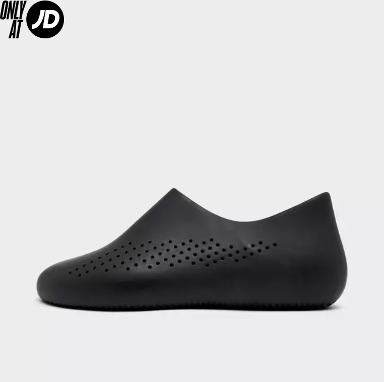 Black slip-on shoe with perforated pattern