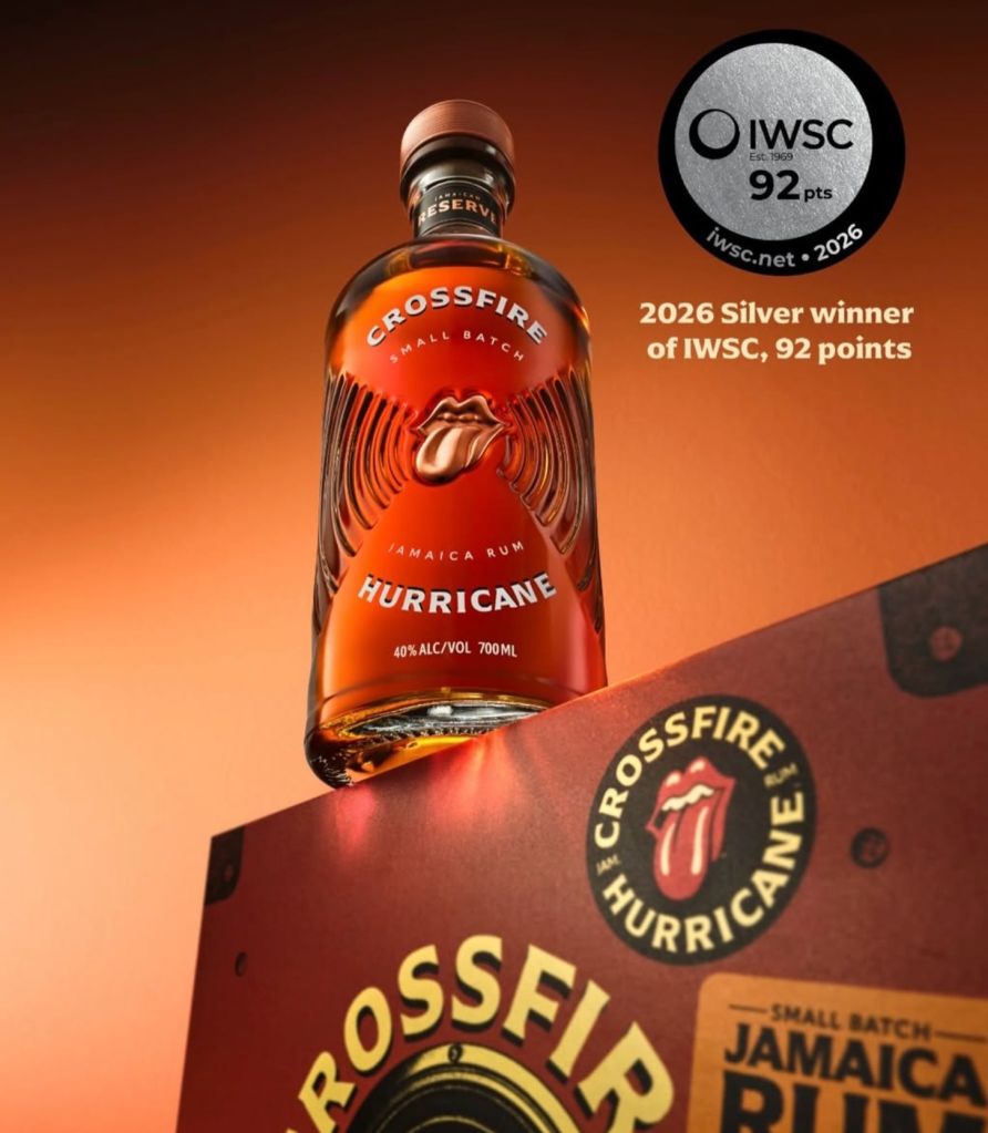 A bottle of Crossfire Hurricane Jamaica rum with the Crossfire logo and "2026 Silver winner of IWSC, 92 points" text.
