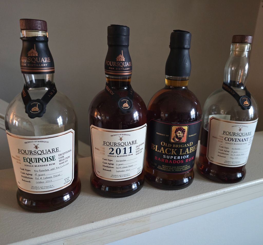 Four bottles of Foursquare rum from Barbados, including Equipoise, 2011 single blended rum, Old Brigand Black Label, and Covenant.