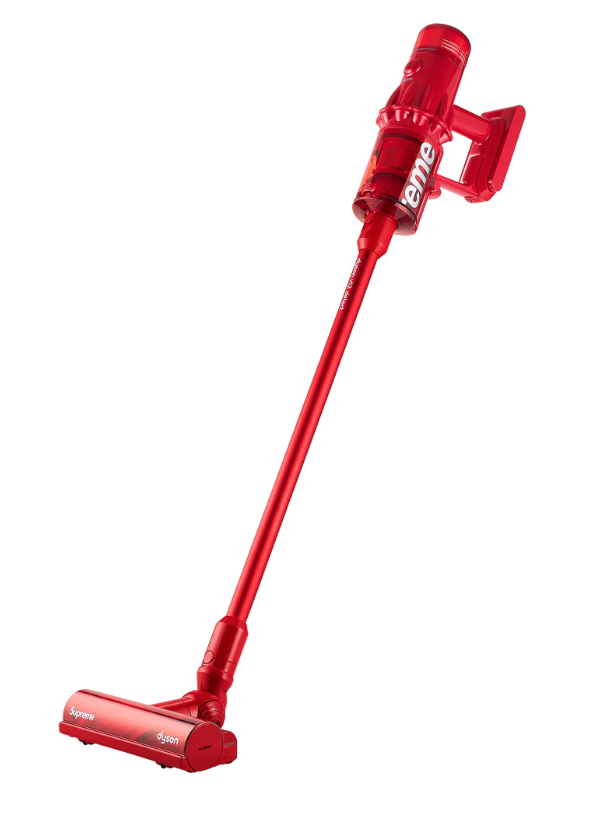A red cordless vacuum cleaner with the Supreme logo.