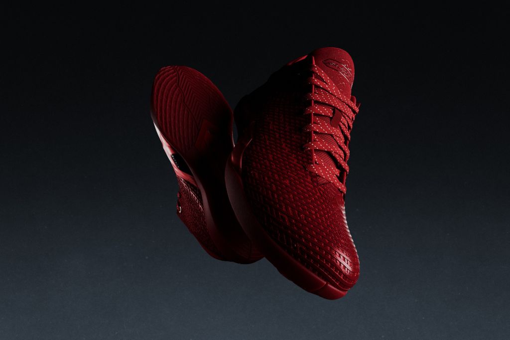 The Air Jordan 41 with a textured, patterned upper against a dark background.
