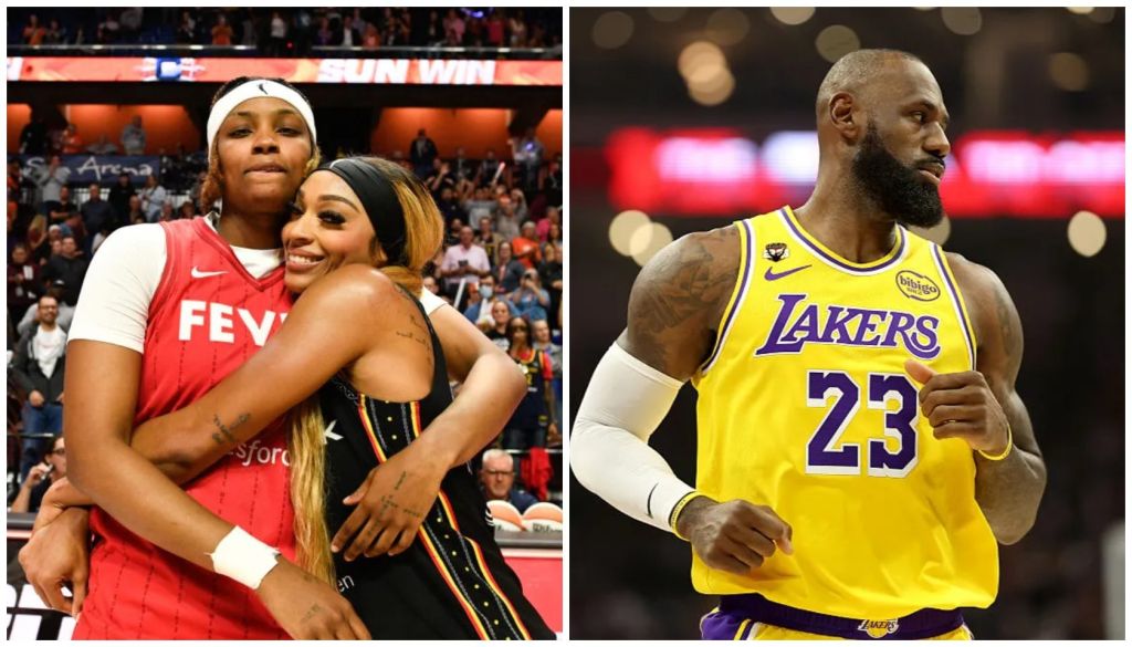 Two basketball players, one in a red jersey and one in a yellow Lakers jersey, embracing on a basketball court with spectators in the background.